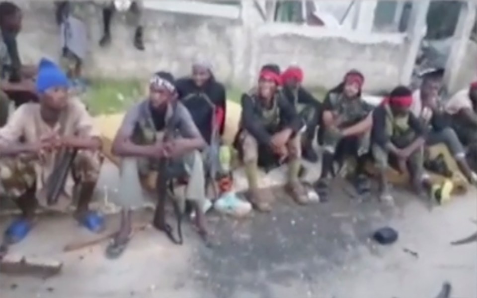 Pictures from an video released by ISIS claiming to show its fighters in Mozambique