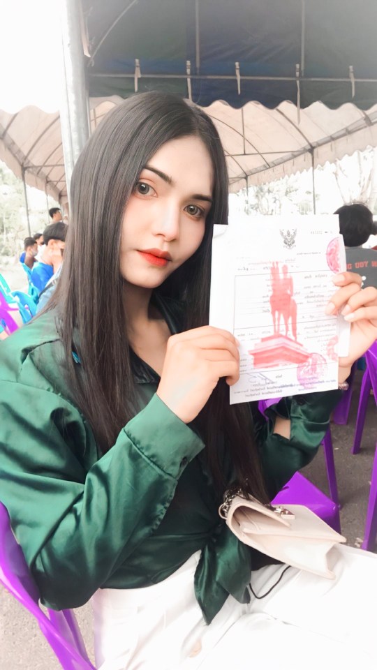 Women posed with their certificates to make a statement regarding equality of the trans community