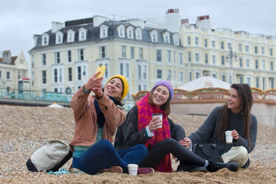 Brits hit the beach in Brighton to meet up with friends on Good Friday