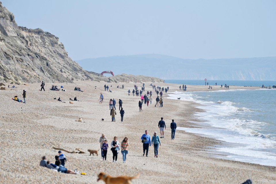 Crowds enjoyed the bright spring sunshine at Hengistbury Head, in Dorset