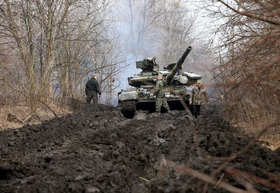 Ukrainian servicemen close to the front line with Russian-backed separatists