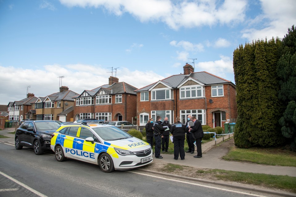 Cops outside the three-bedroom home in Buckinghamshire