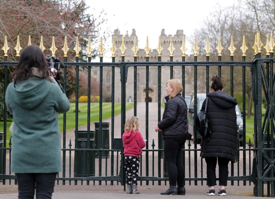 Brits have gathered at the gates of Windsor to pay tribute and lay flowers