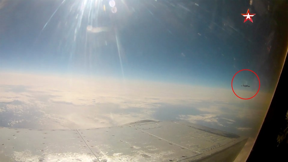 The American plane is seen from the cockpit of the Russian warplane