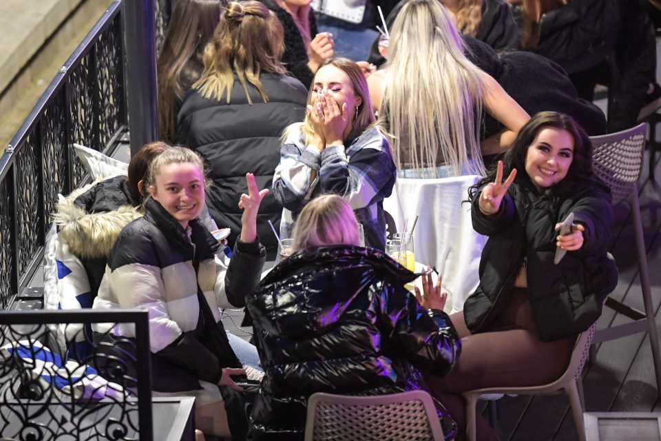 Revellers in Birmingham out enjoying drinks in the city centre