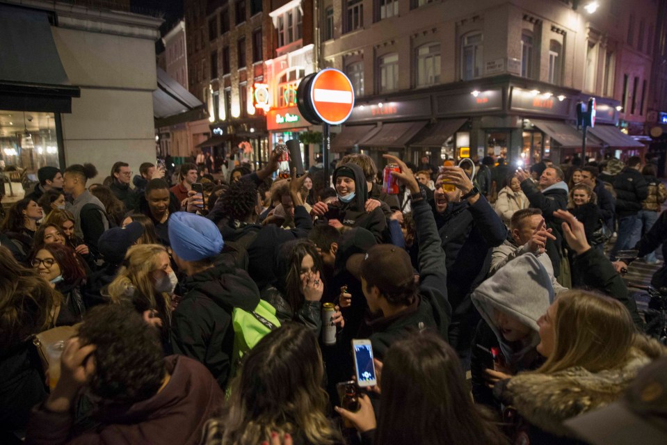 Huge crowds gathered in the streets of Soho, London last night