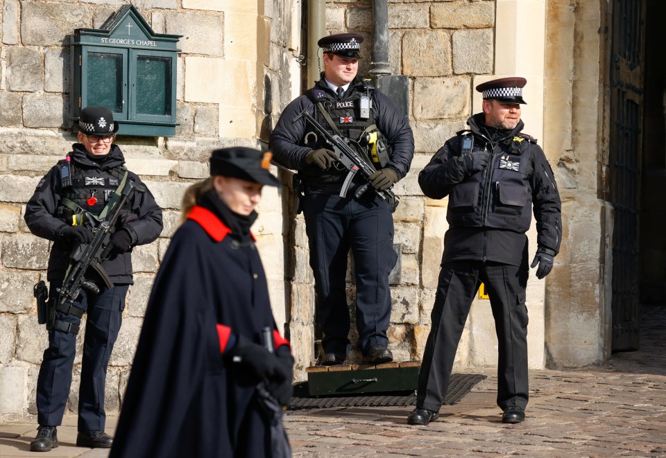 Armed cops stand guard outside St George's Chapel