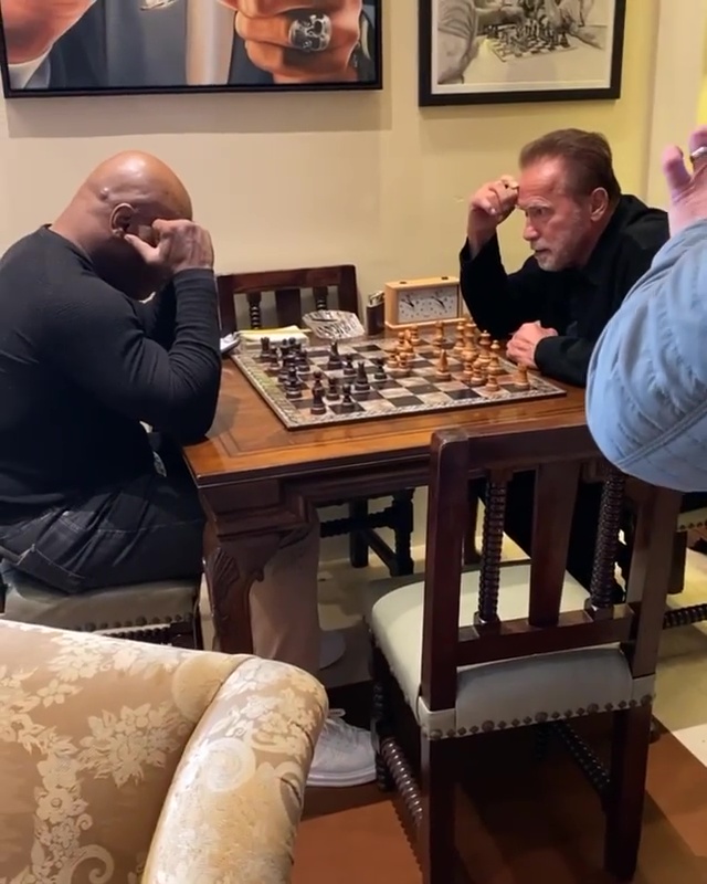 Mike Tyson and Arnold Schwarzenegger locked horns in a game of chess