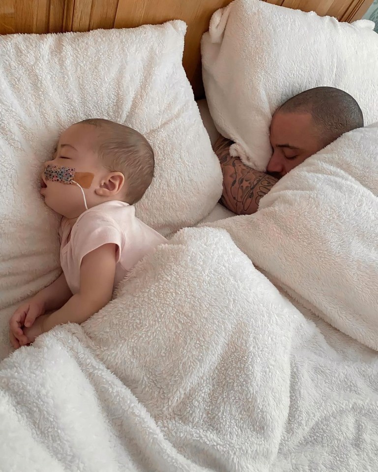 Azaylia often enjoyed sleep and cuddles alongside her dad