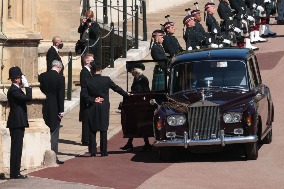 Camilla steps out of a car to go into the chapel