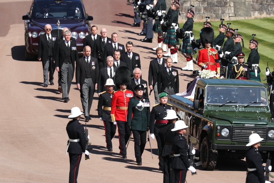 The procession behind Prince Philip's coffin in the Land Rover