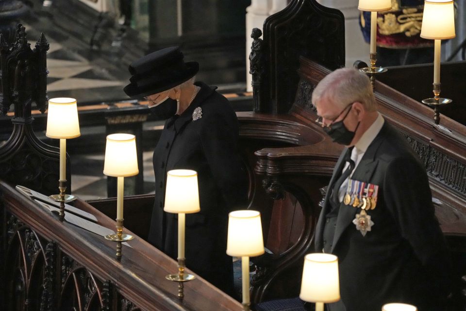 The Queen and Prince Andrew bowed their heads during the service