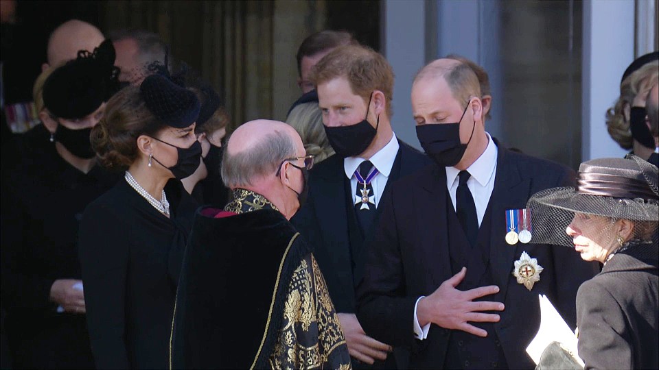 Kate, William and Harry talking to the Dean of Windsor after the emotional service