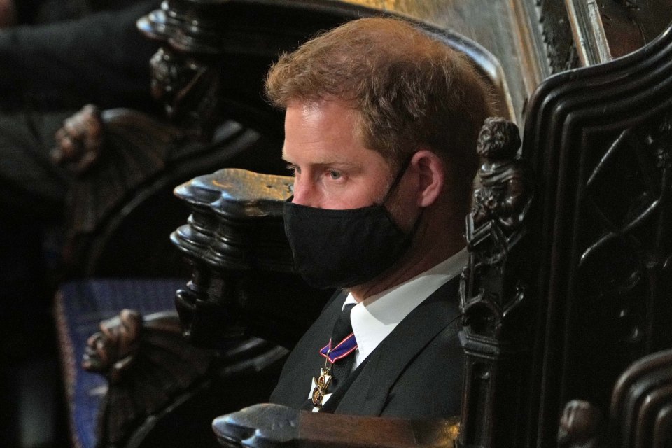 Prince Harry sitting alone in the chapel during the funeral