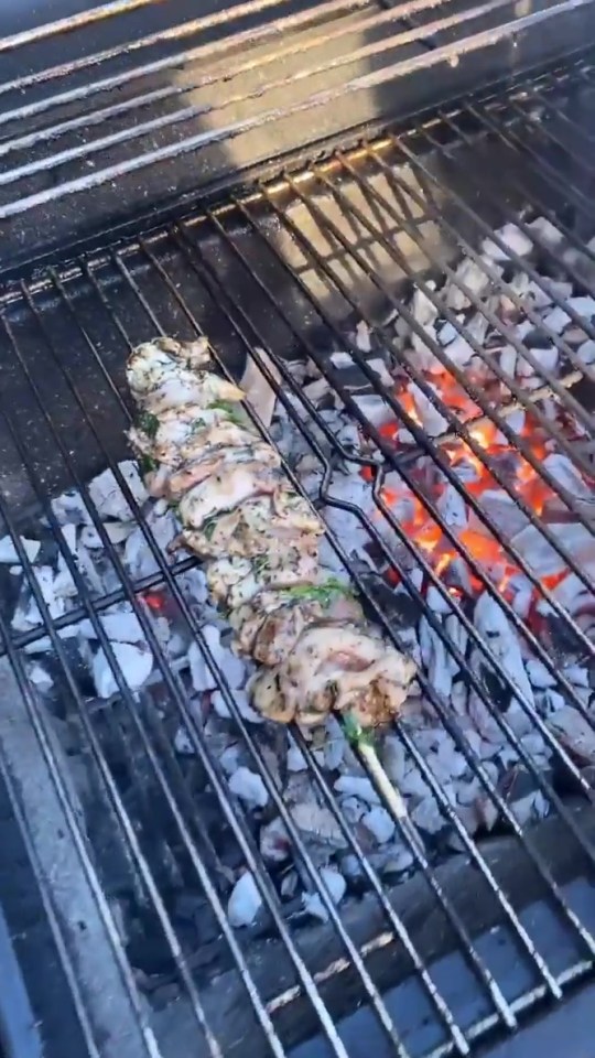 She cooked the skewers on a coal barbeque