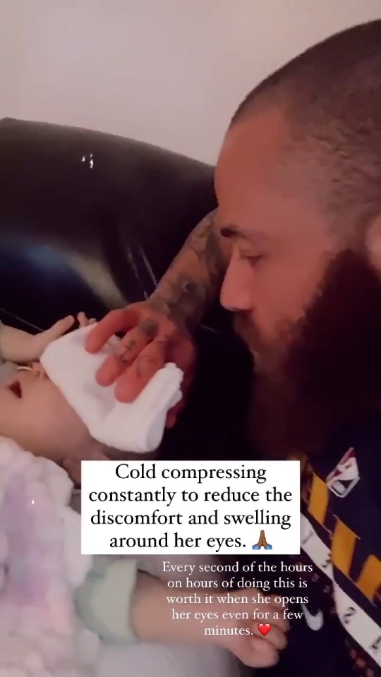 Ashley dabbed his daughter's eyes to help her to be able to see