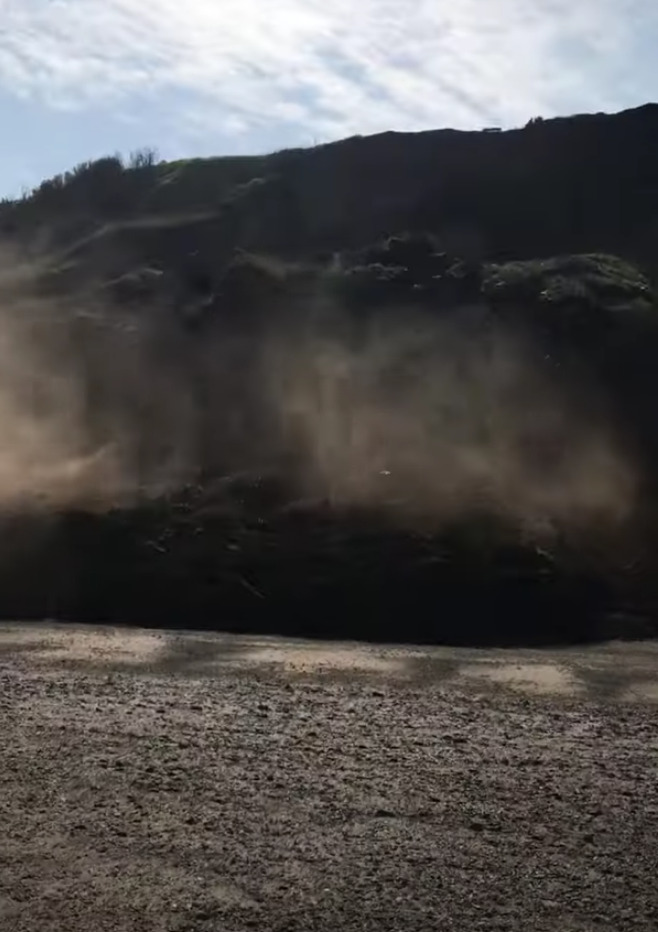 A woman captured the moment she had to run for her life and narrowly escaped a massive landslide