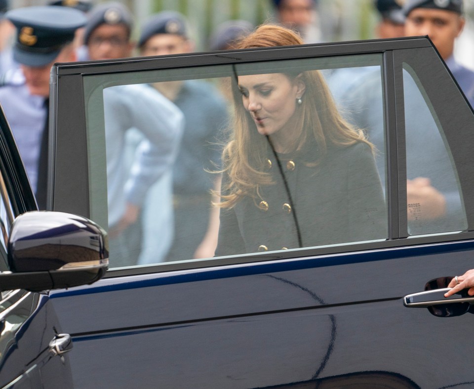 The Duchess of Cambridge heading back to the car to leave the visit