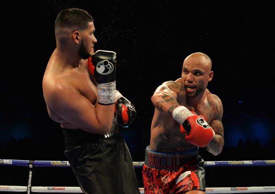 Vallily (right) has won 17 out of his 21 professional fights inside the squared circle