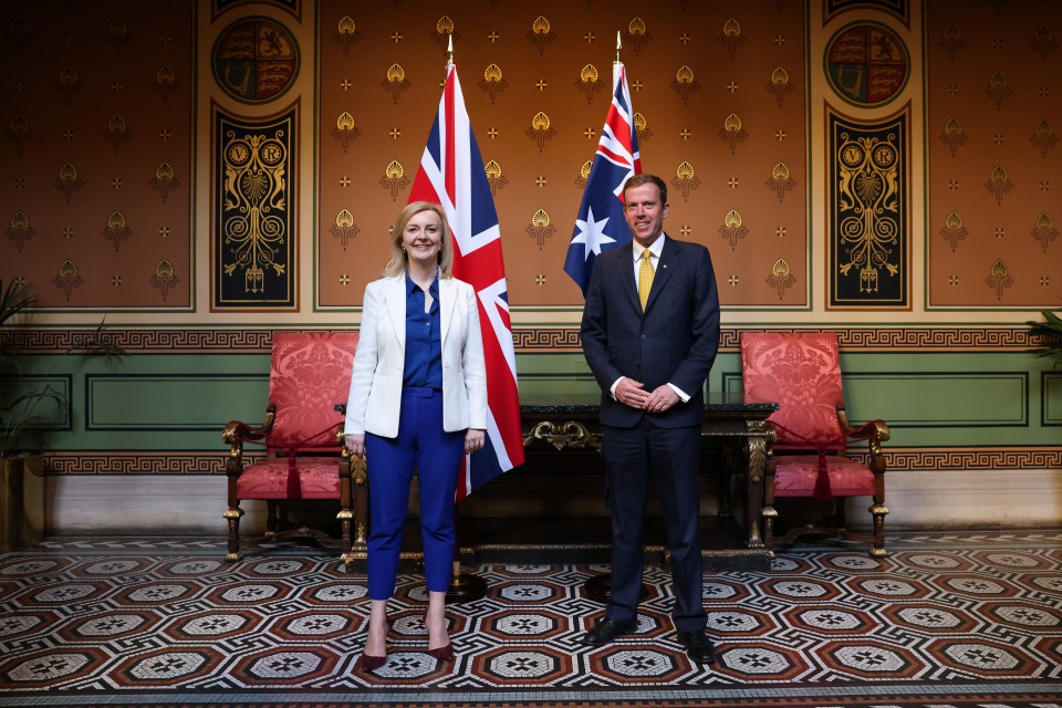 Britain is on the brink of signing a landmark trade deal with Australia, pictured Liz Truss with counterpart Dan Tehan