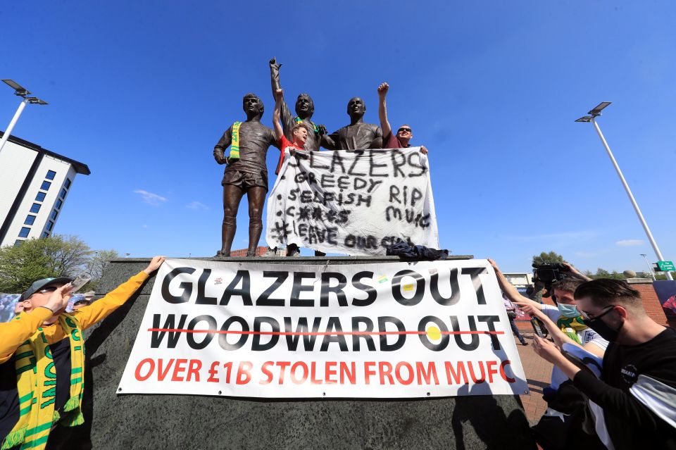 Banners and signs were put up as the heat grows on the American owners