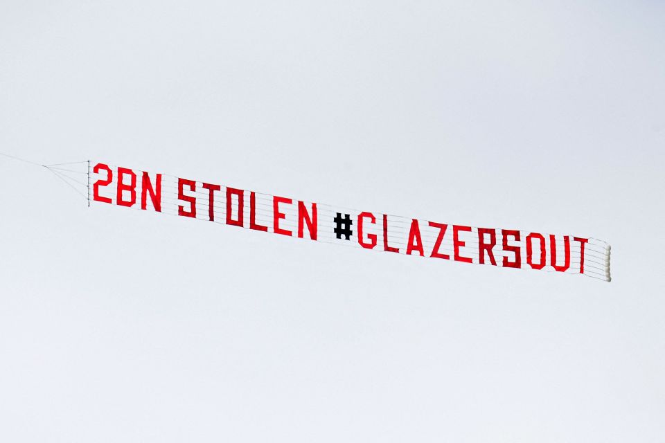 Manchester United fans flew a banner calling on the Glazers to sell the club