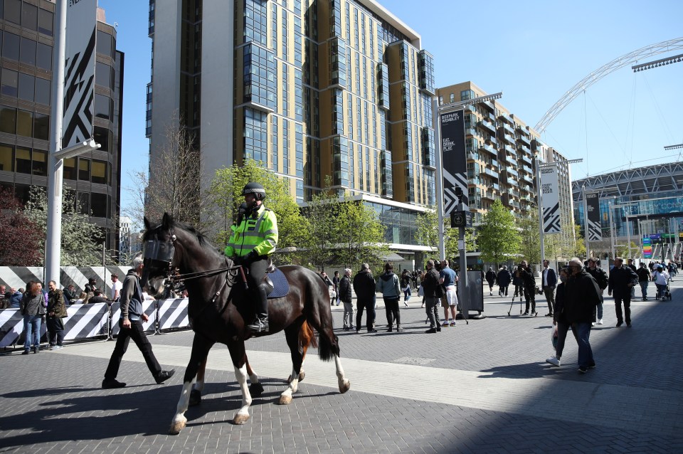 Police patrolled the outskirts of the stadium to ensure social distancing was being properly adhered to