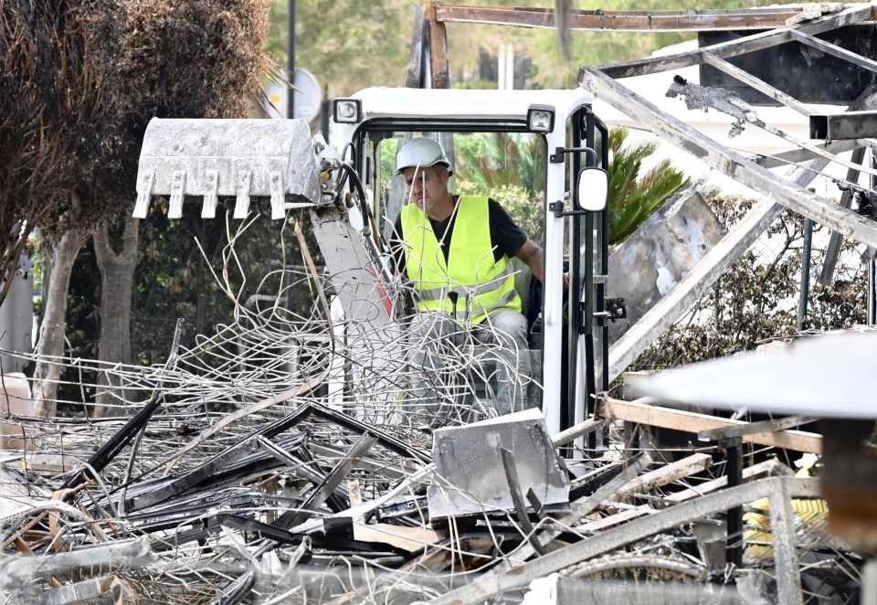 Balldozers were brought in to deal with the rubble