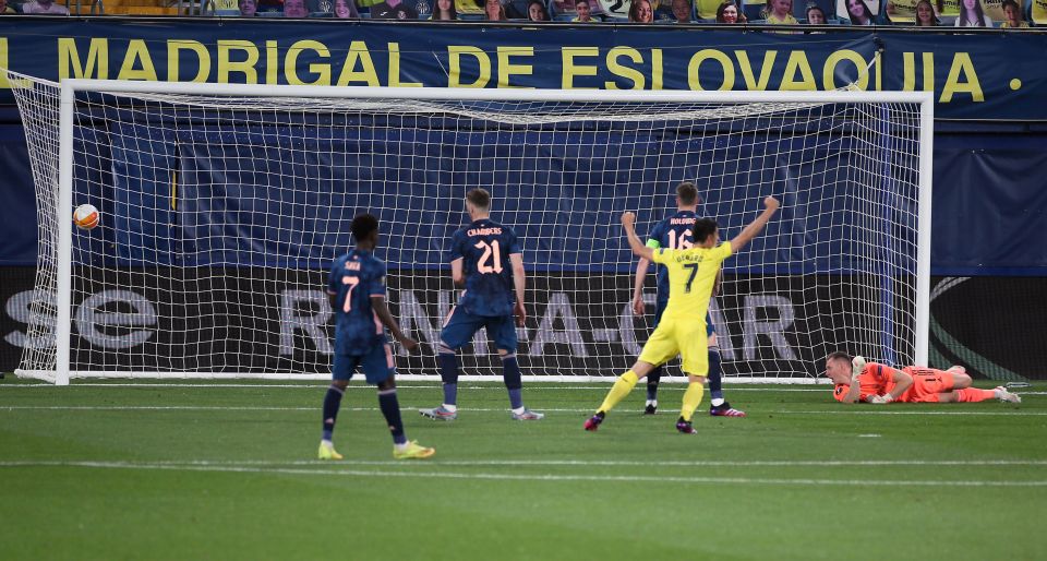 Villarreal's Manuel Trigueros, out of picture, hits the home side's opener