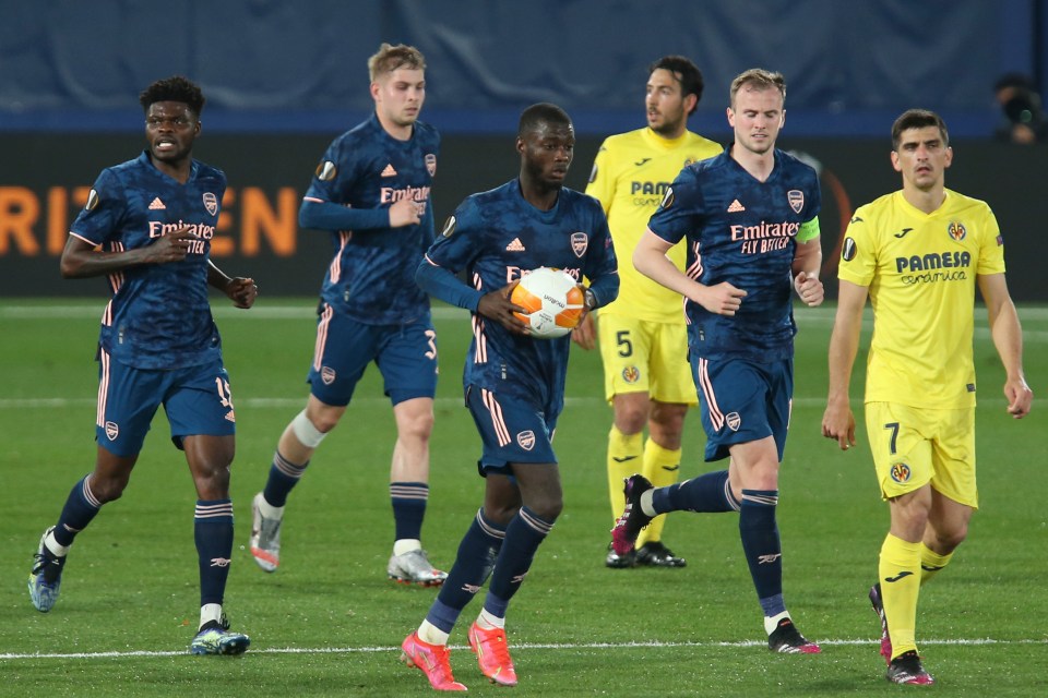 Nicolas Pepe walks back after bagging what might be a vital away goal for Arsenal from the penalty spot on 73 minutes