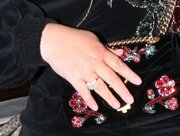 The star slipped the ring on her right hand before heading out for dinner