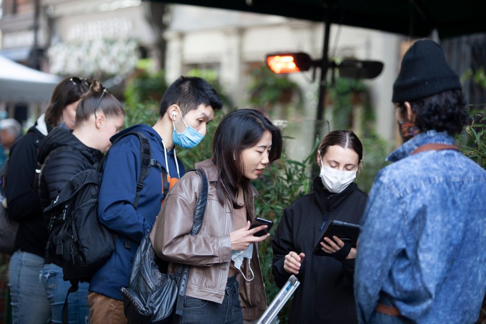 Restaurants in London's Borough Market host diners and drinkers on a cold sunny day