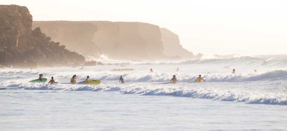 Book a lesson with Corralejo Surf School to learn the basics over four hours