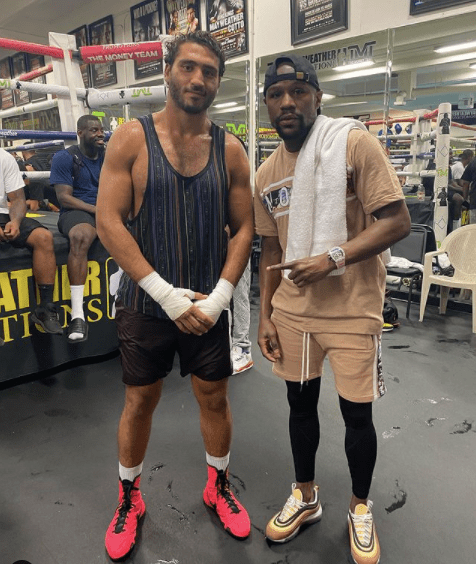 Ahmed Elbiali pictured with Floyd Mayweather