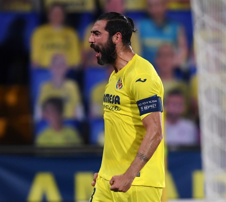 Villarreal veteran Raul Albiol roars his approval at making it 2-0