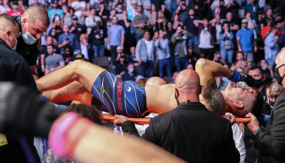 He was stretchered away and taken to hospital after the horror injury against Uriah Hall