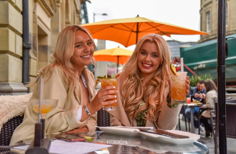 People in Newcastle enjoy an afternoon drink as the bank holiday weekend celebrations begin