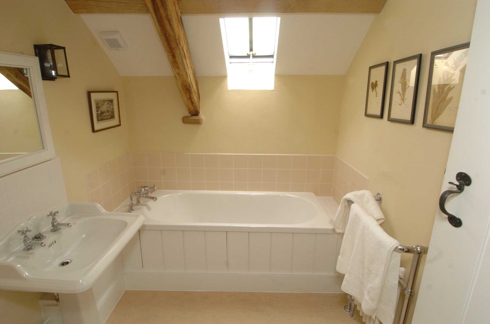 The simple cream colour-scheme also appears in the royal bathrooms