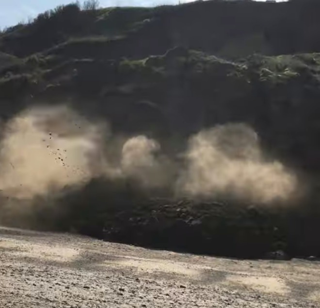 Cops urged people to stay away from beach in case of more falls