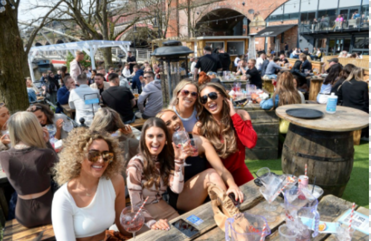 Friends celebrated their new freedoms with drinks in Manchester's beer gardens