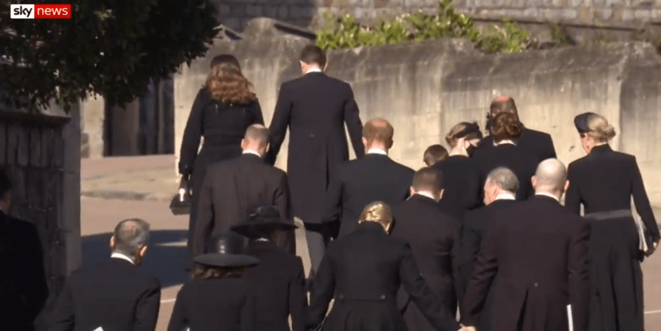 The brothers were pictured walking together and talking after the service