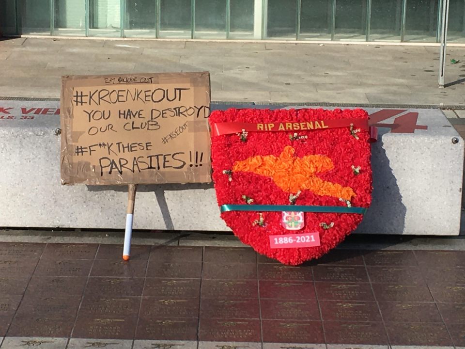 A wreath alongside a stern message towards the Kroenke family was laid outside the ground