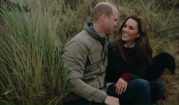 William and Kate were captured gazing lovingly at each other with their dog just visible behind Kate