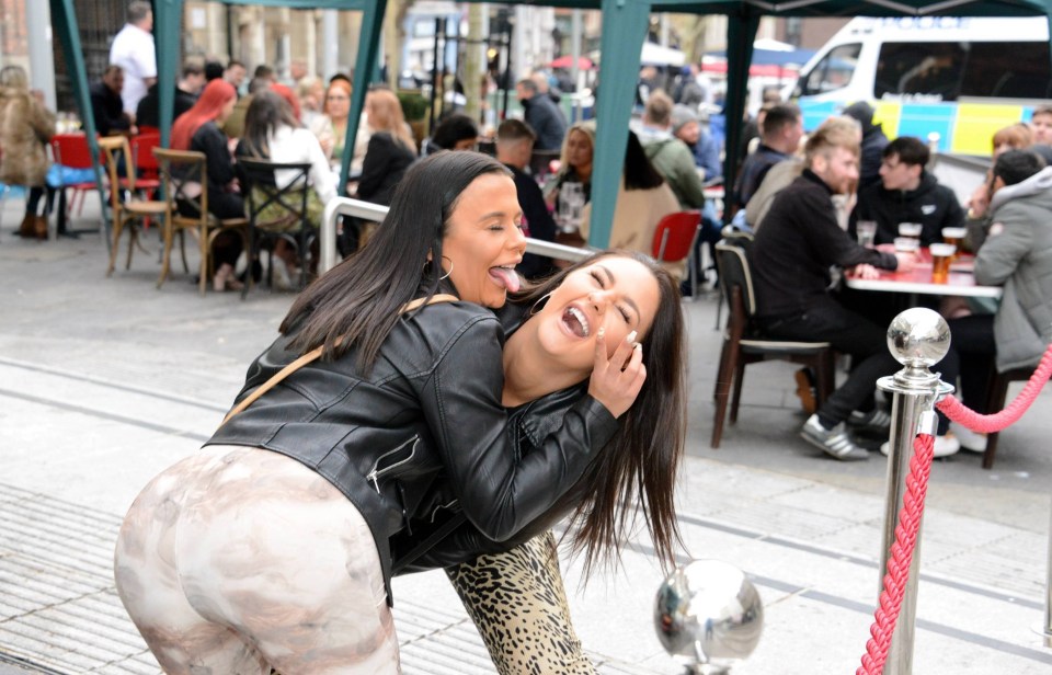 Two women enjoying the newfound freedom in Newcastle