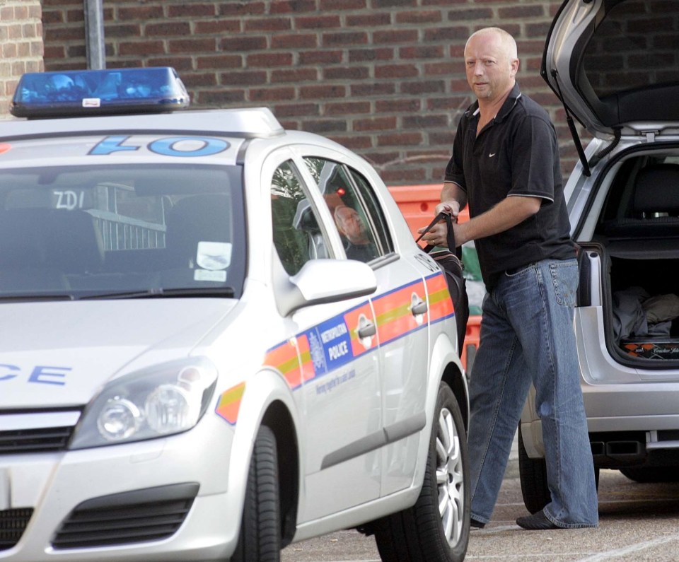 Giles arriving at Croydon Police Station ahead of his extradition to the US in 2006