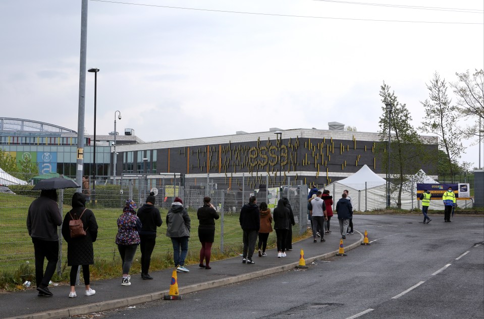 Officials set up mobile testing units at the Essa Academy