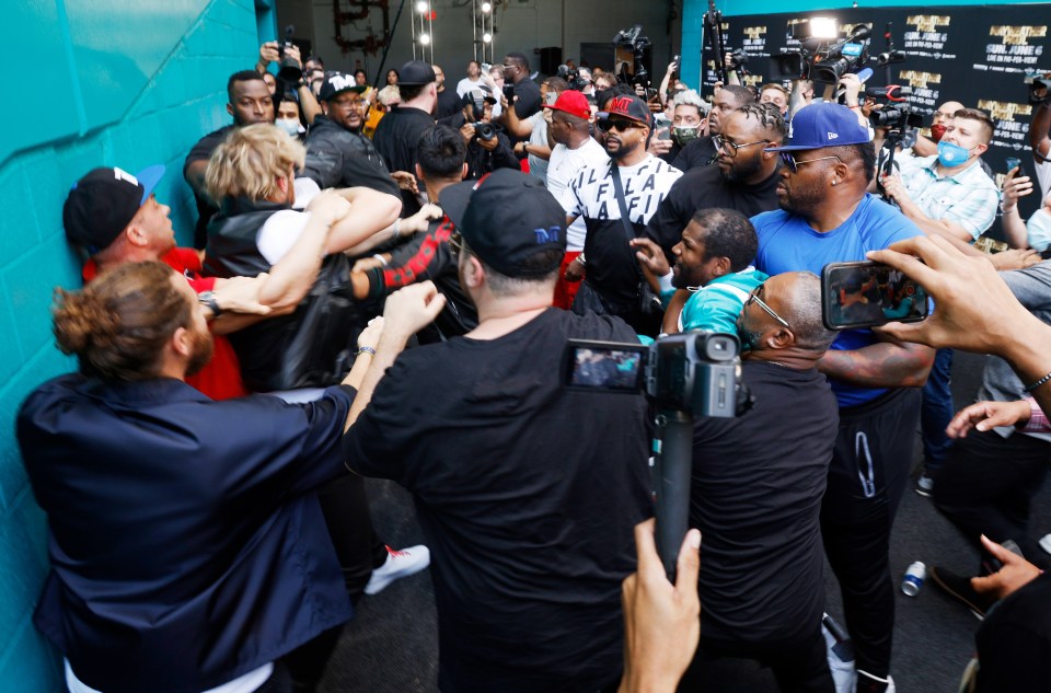 Logan Paul, left in black, involved in the melee