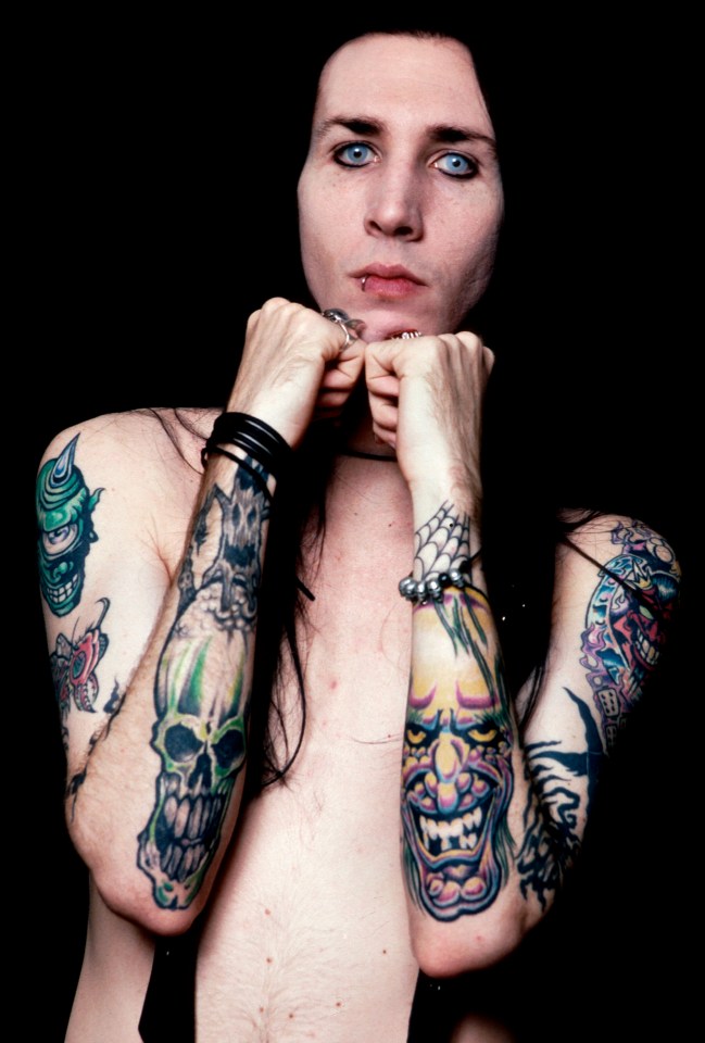 Rock singer Marilyn Manson aka Brian Warner displaying his tattoos. 