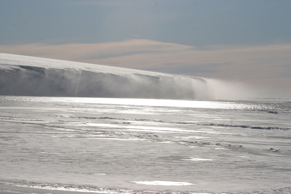 Ice shelves are floating sheets of ice permanently attached to a land mass. Pieces of ice that break off are called icebergs. Pictured is Antarctica's George VI Ice Shelf