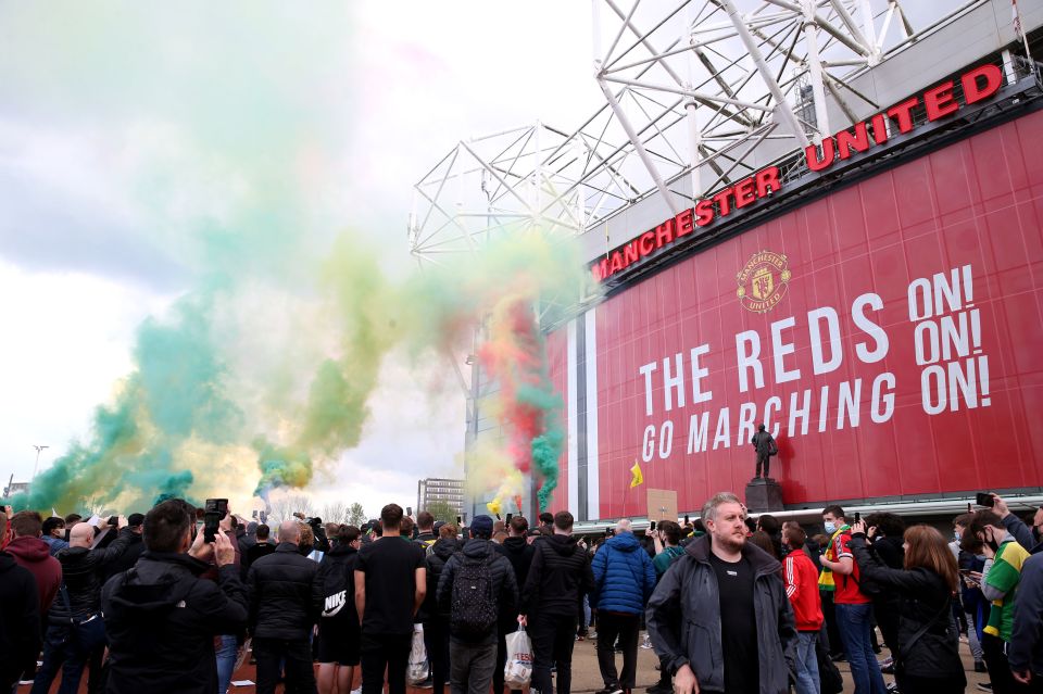 Manchester United fans protesting outside Old Trafford